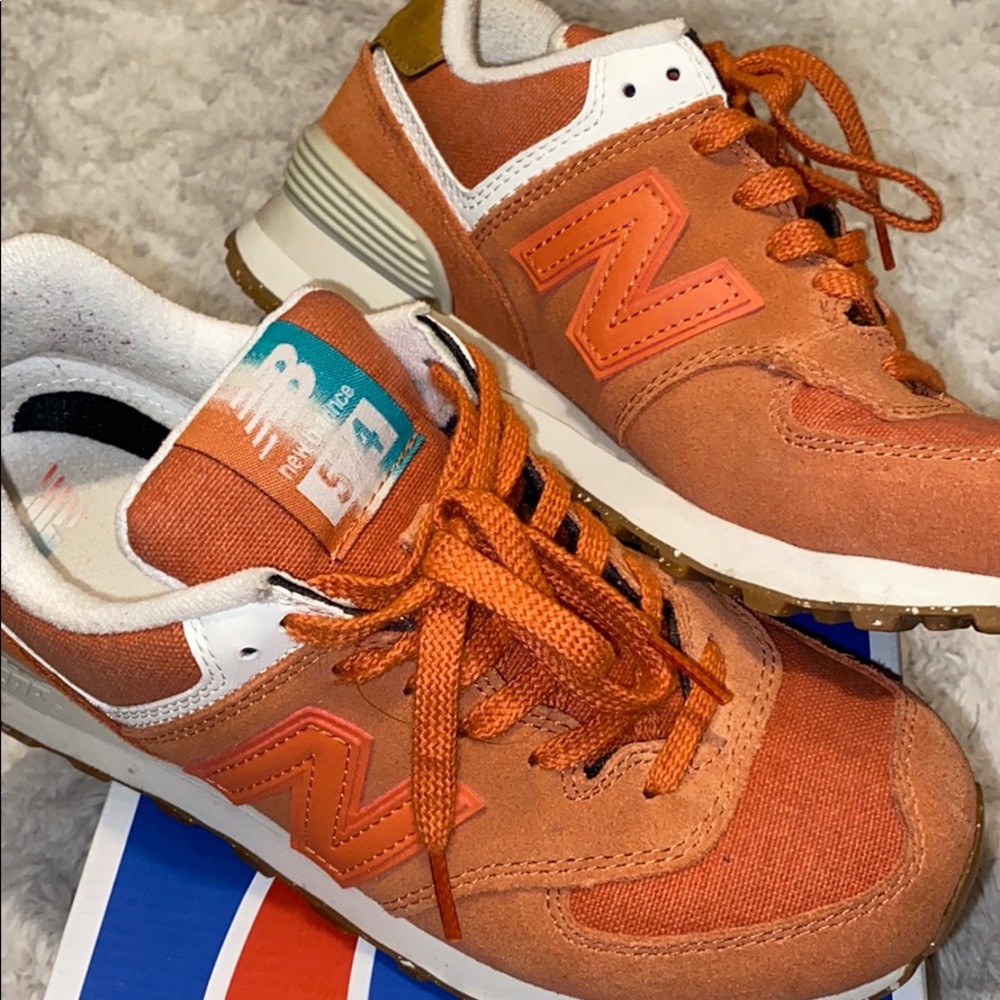 Orange New Balance 574s